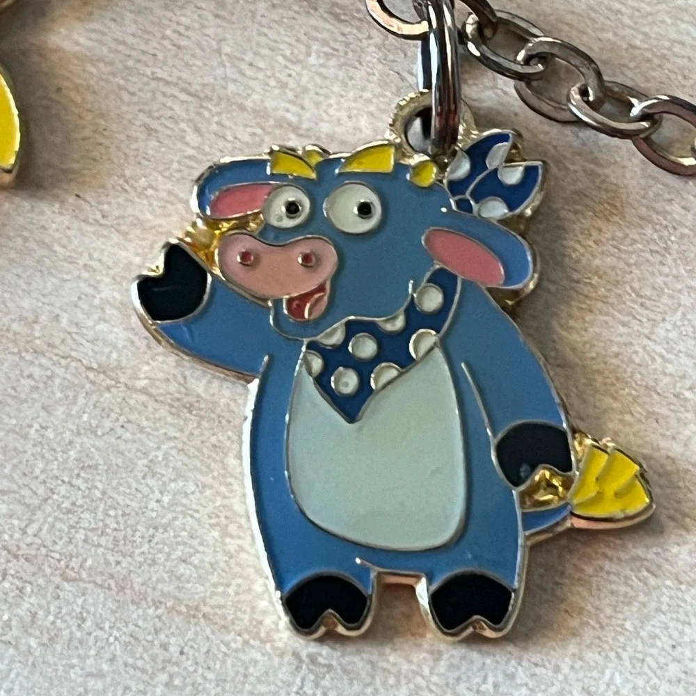Nickelodeon Dora the explorer kids bracelet with 6 enamel characters.